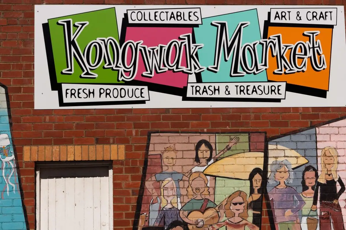 The colourful Kongwak Market sign and mural