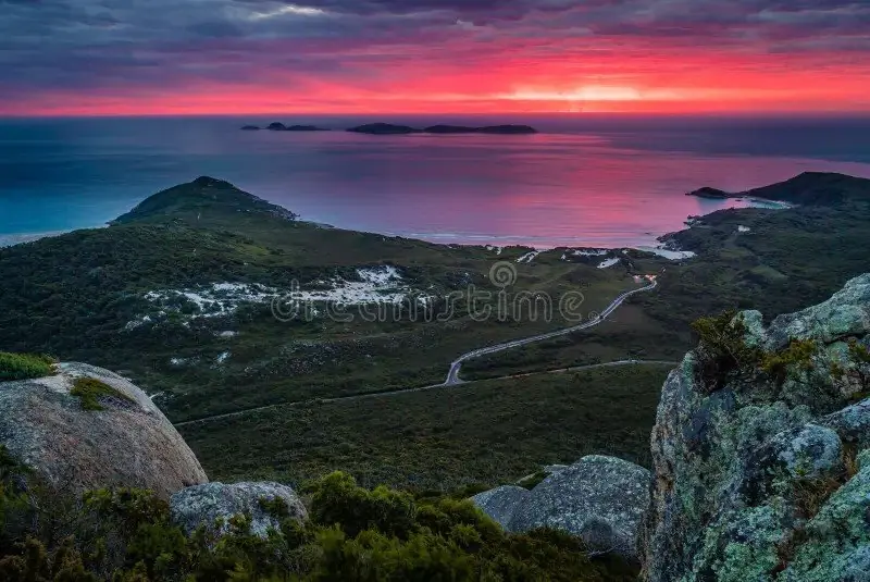 Sunset over the coast and bays of Wilsons Promontory from a high lookout